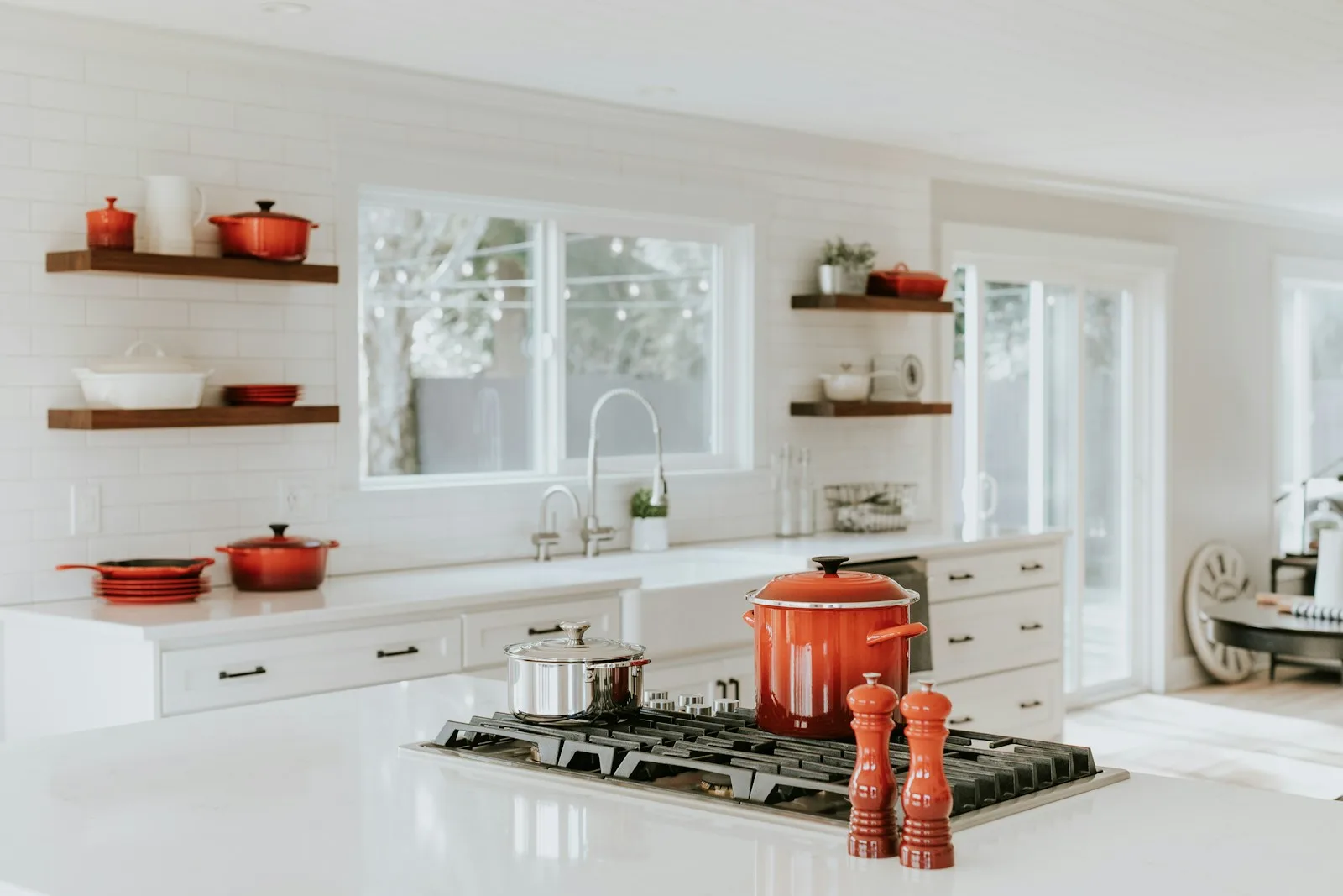 Detail of task lighting with recessed LED strip underneath upper cabinets illuminating food prep counter